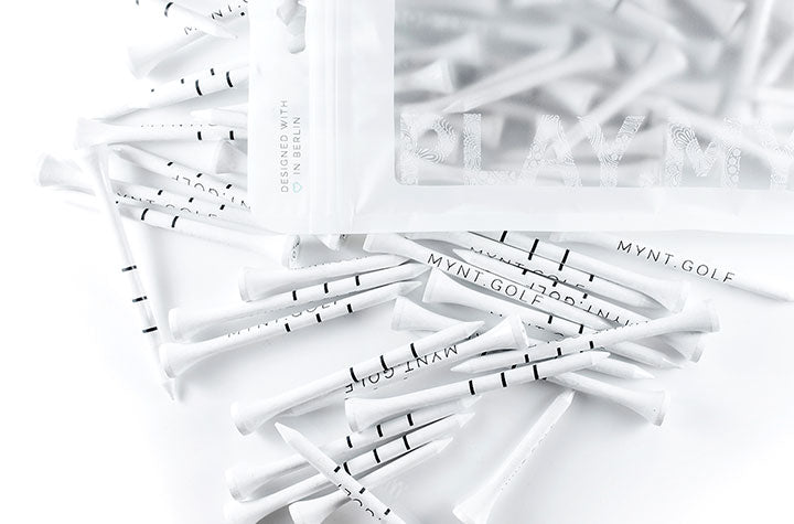 MYNT Golf Tees auf dem Tisch